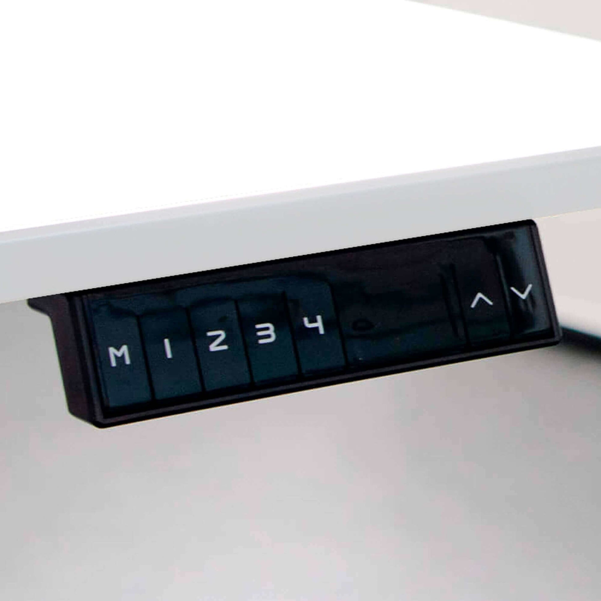 Close-up of Premium Ergo height-adjustable desk control panel with preset buttons for ergonomic adjustments.